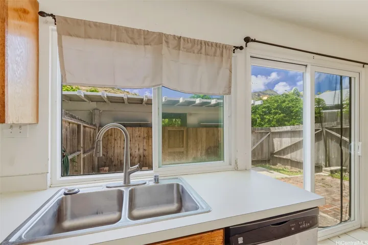kitchen views overlooking the private courtyard, offering the perfect canvas for your personal touch.