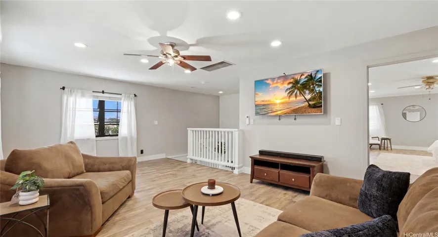 Huge, flexible upstairs loft space ideal for a second family room, media center, or home office.