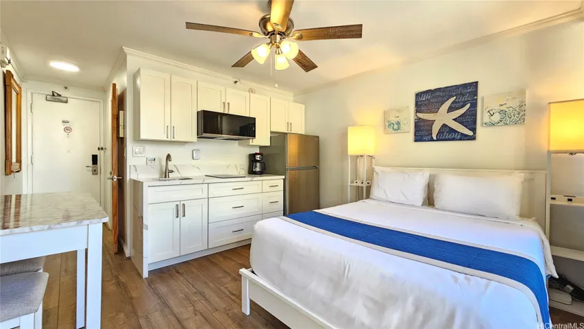 NEW: solid wood cabients, waterfall quartz countertop, induction cooktop, slim-line microwavehood, full size refrigerator, queen bed and furniture