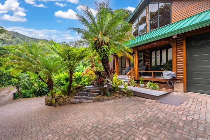 Entry to Covered Porch and Water Feature