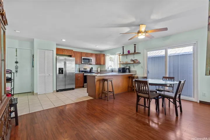 Open Living area in the front of the home. Internal blinds feature in the dining area's sliding glass doors. Great for controlling lighting and making the space comfy!