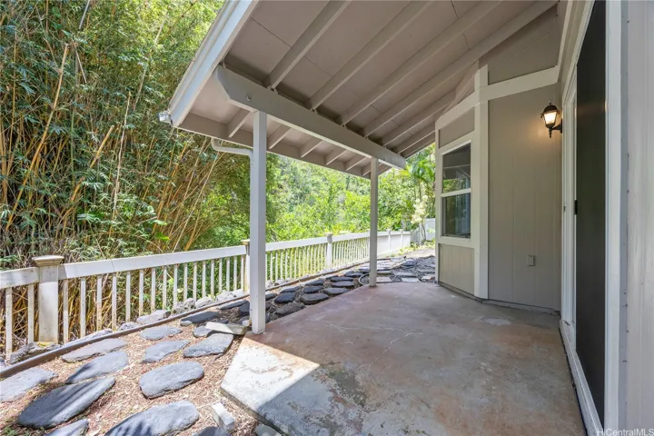 Rear covered lanai with serene views of the valley