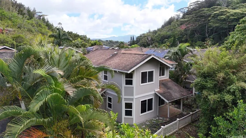 Aerial view of the property with lush Launani Valley surroundings