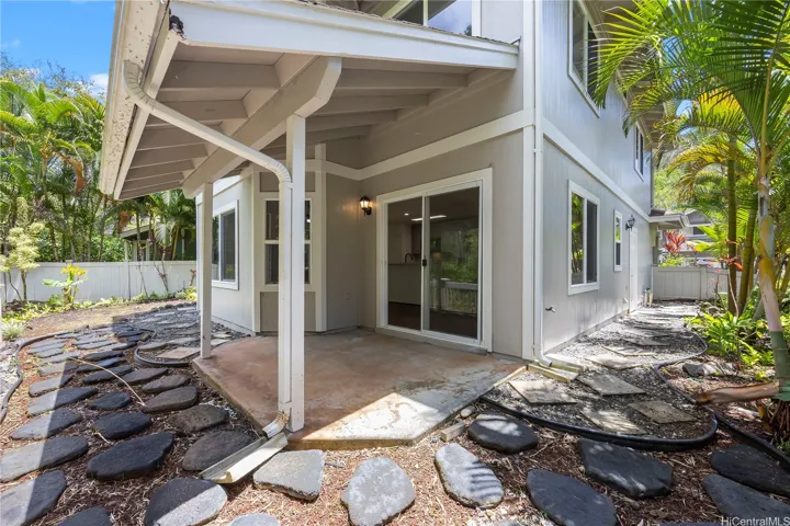 Rear covered lanai with serene views of the valley