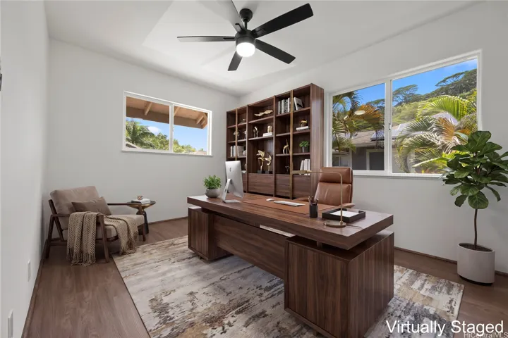 Fourth bedroom staged as an office