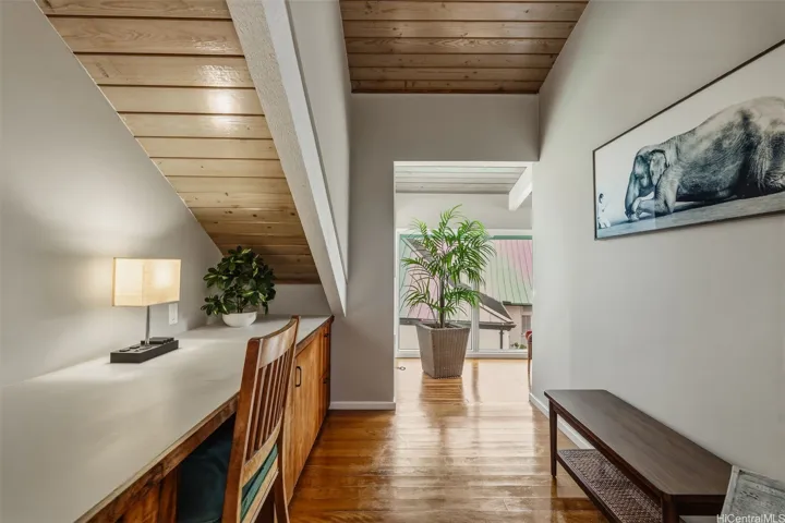 Upstairs office w/viewing area behind.