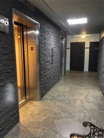 Two elevators up to the second floor, left turn, right turn.  #211 is right there