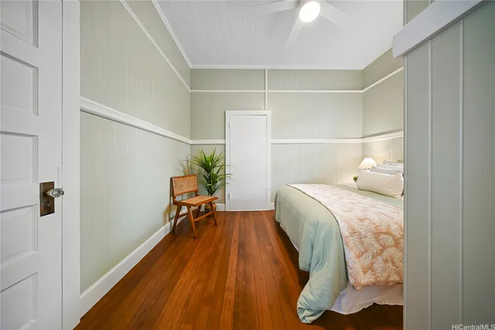 Bedroom 3 with closet to left and window on wall to the right.