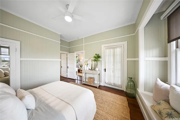 Closet to the left and a walk-out door that leads directly from the primary suite to the covered porch.