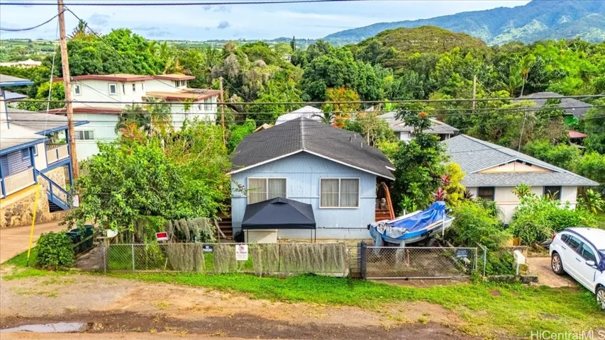 From Paalaa Rd - upper house is raised 3BR/1BA