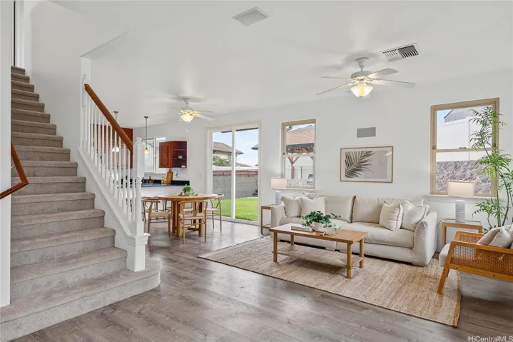 Another view of the main living area with direct access to the dining space and backyard.
