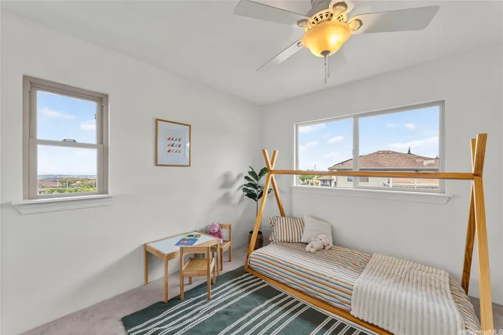 Flexible bedroom perfect for kids or overnight guests, with plenty of natural light.