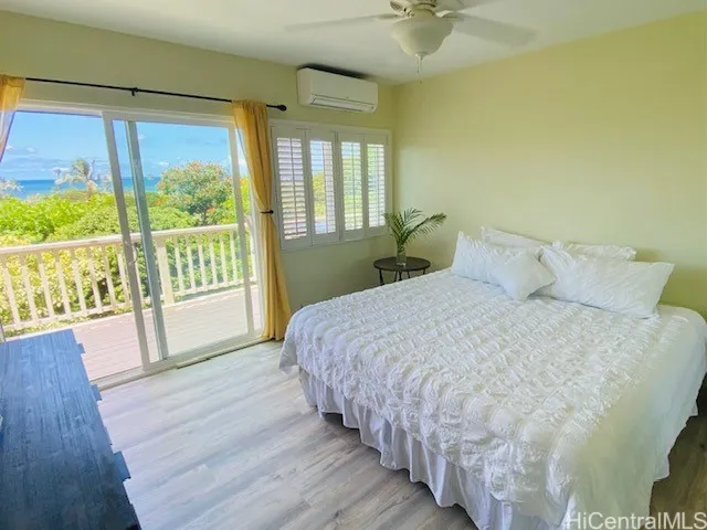 Second downstairs bedroom - ocean views, lanai, ceiling fan and split AC.
