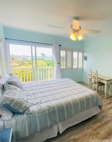 Downstairs bedroom with lanai and ocean views