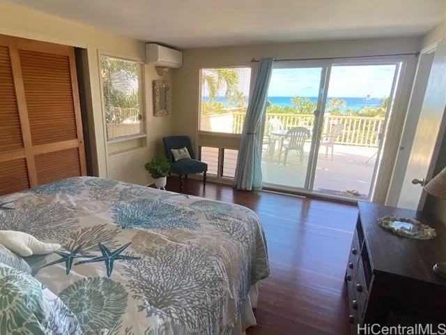main level bedroom leads out to lanai and has gorgeous ocean views