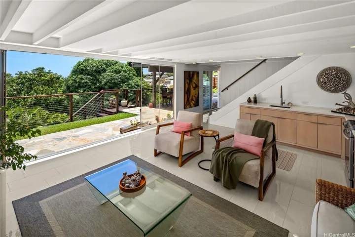 The downstairs entertainment room features a kitchenette, which is very handy for movie nights and entertaining.