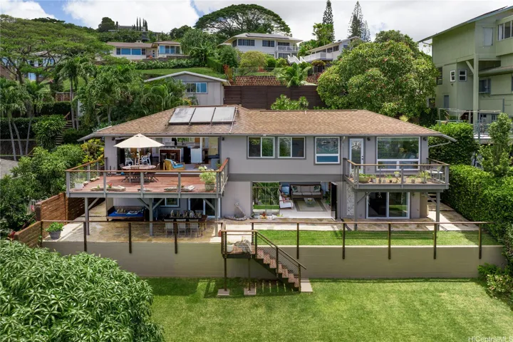 Beautiful lawns and greenery to view from rooms with full-extension doors, and from patios/decks on both levels. Perfect indoor/outdoor living!