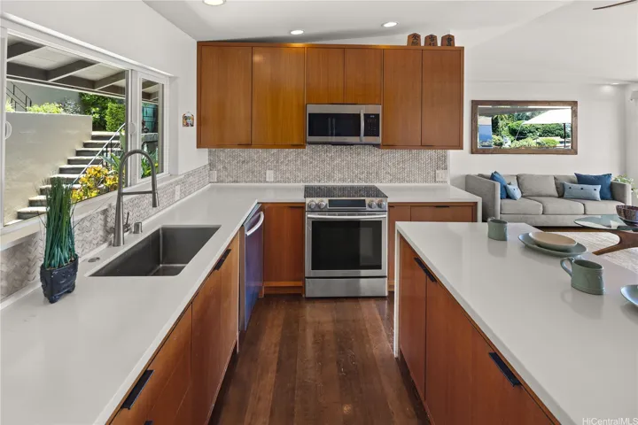 Plenty of cabinets and counter space plus an island in the kitchen.