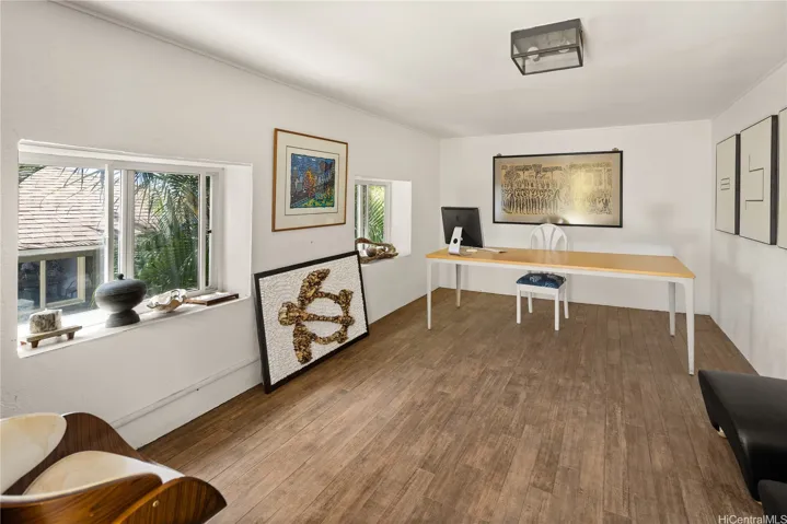 This art room is also perfect for an office, playroom, or additional bedroom.