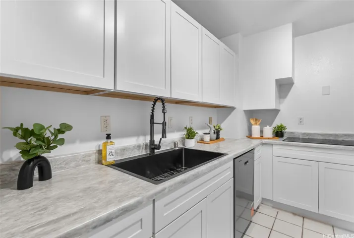 RENOVATED KITCHEN W/ NEW DISHWASHER, CABINETS, COUNTERS, SINK & REFRIGERATOR