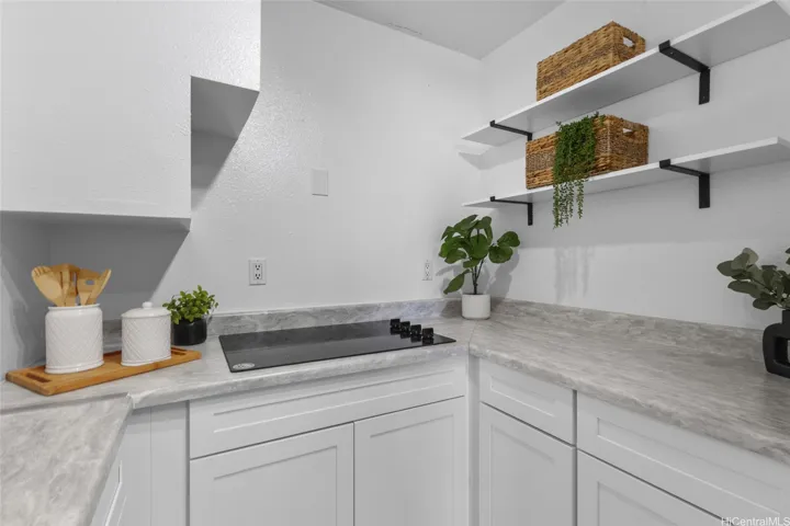 UPDATED COOKTOP, SHELVING & LOTS OF STORAGE