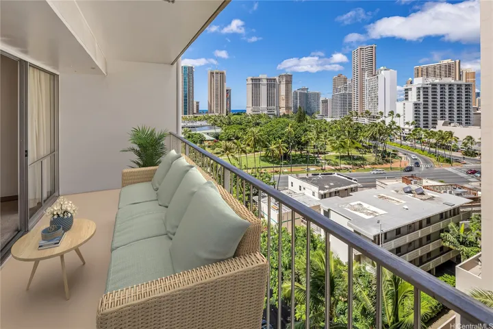 Enjoy the green space of Fort DeRussy Park and a peekaboo ocean view from the lanai. Enhanced photo.