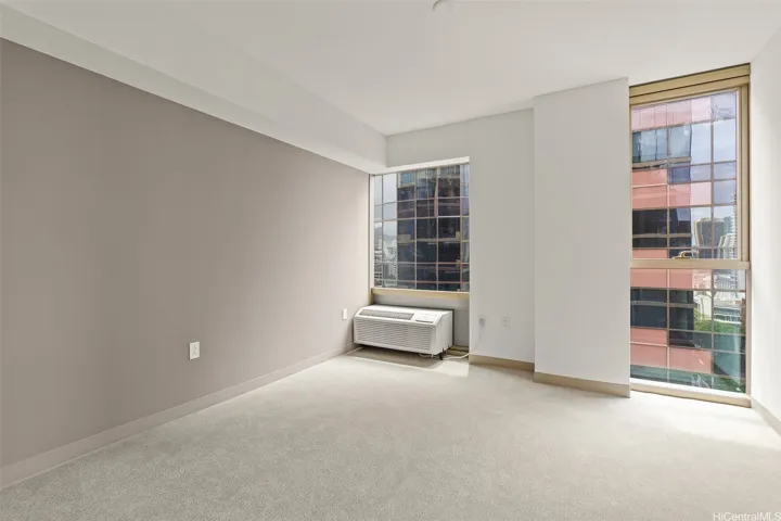 Actual photo taken of the same floor plan, but one floor lower. View will be slightly different.