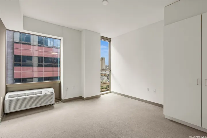 Actual photo taken of the same floor plan, but one floor lower. View will be slightly different.