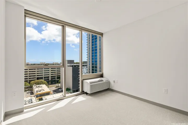 Actual photo taken of the same floor plan, but two floors lower. View will be slightly different.