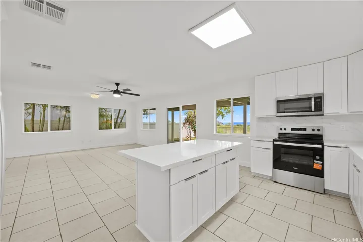 Spacious open kitchen with large island for food prep and entertaining