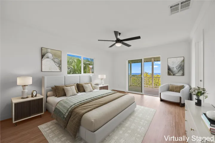 Second level primary bedroom with large covered lanai
