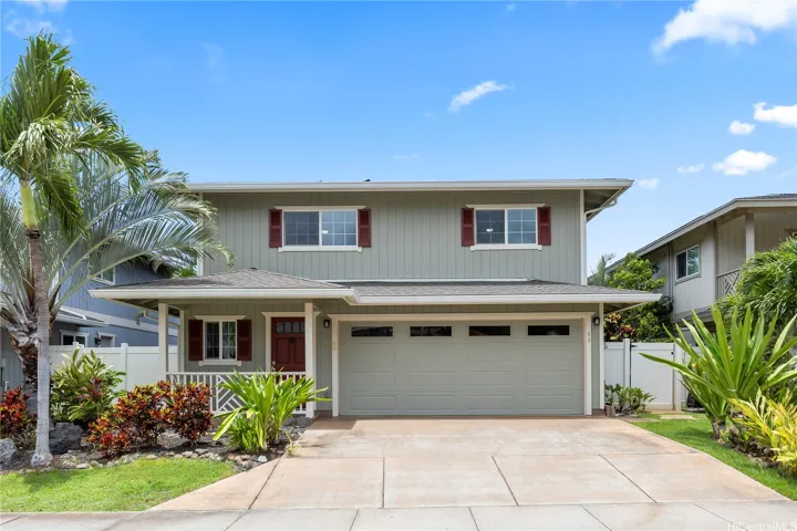Front street view portraying an island style home with modern finishings