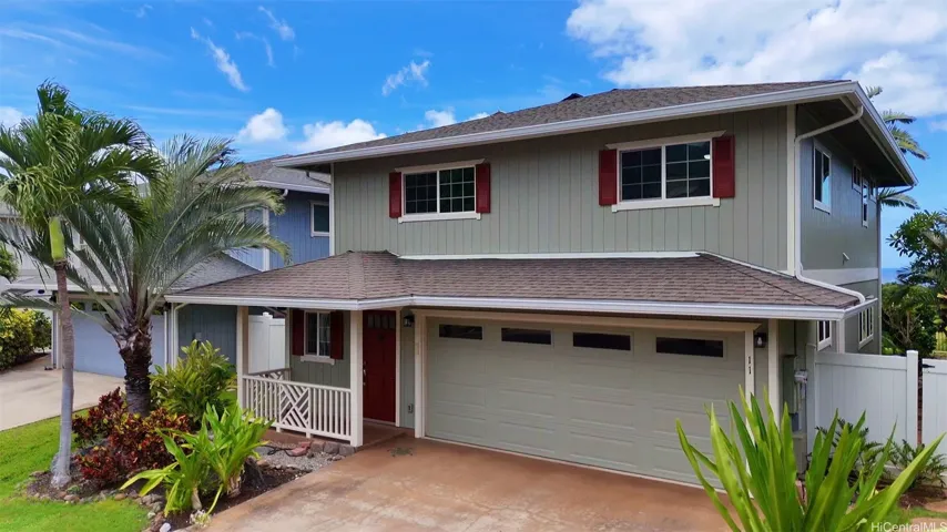 Front street view portraying an island style home with modern finishings