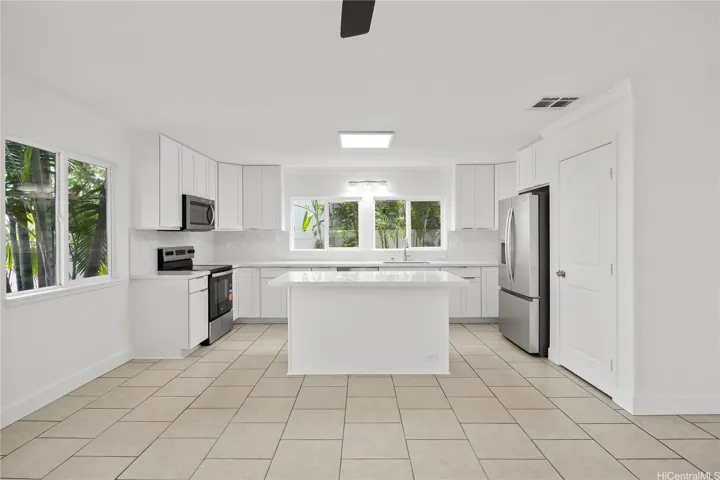 Spacious open kitchen with large island for food prep and entertaining