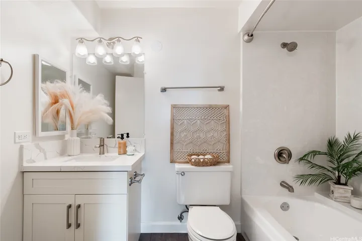 Virtually staged bathroom — spa-like finishes and updated throughout