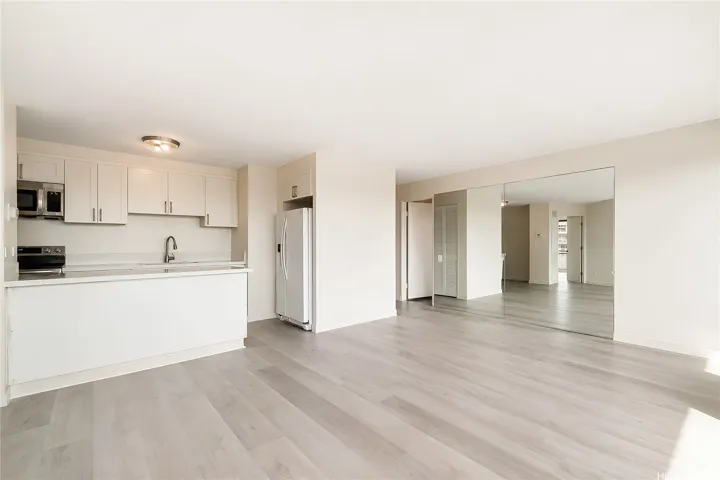 Open concept living, dining, and kitchen area.