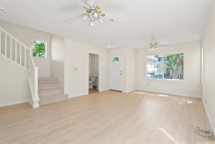 Spacious living room, with half bath.