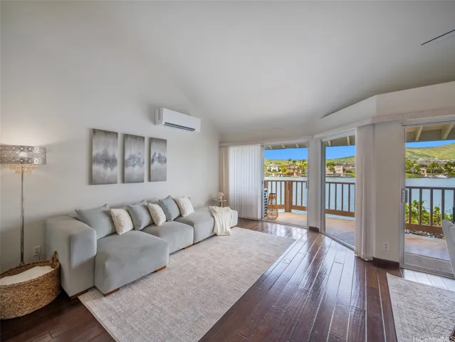 Bright living room with vaulted ceilings