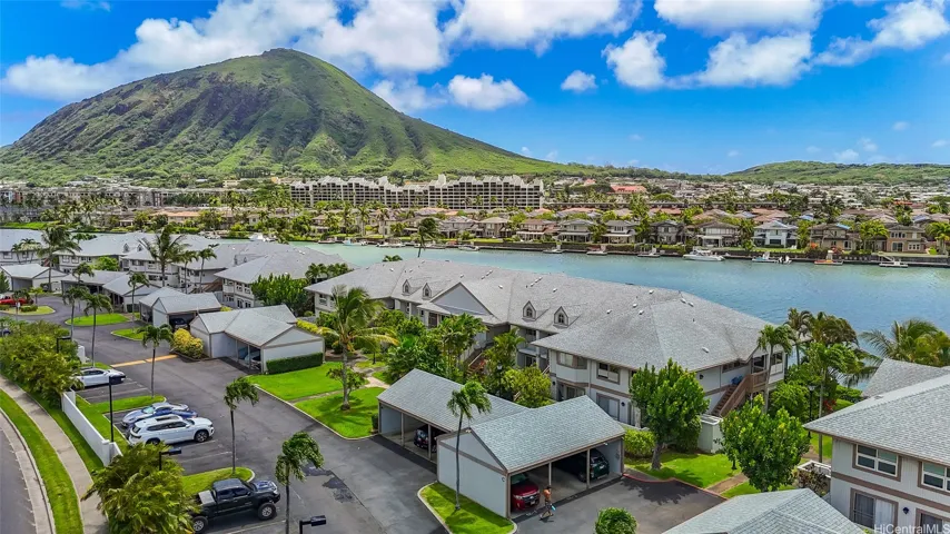 Aerial view of the gated marina-front community with beautiful Koko Head views. Ideally situated between the front and side gates for convenient access, with ample guest parking nearby.
