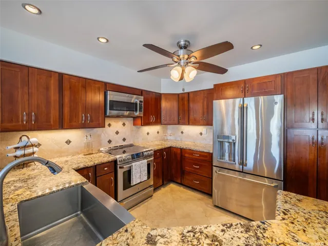 Updated kitchen with ample cabinets and counter space