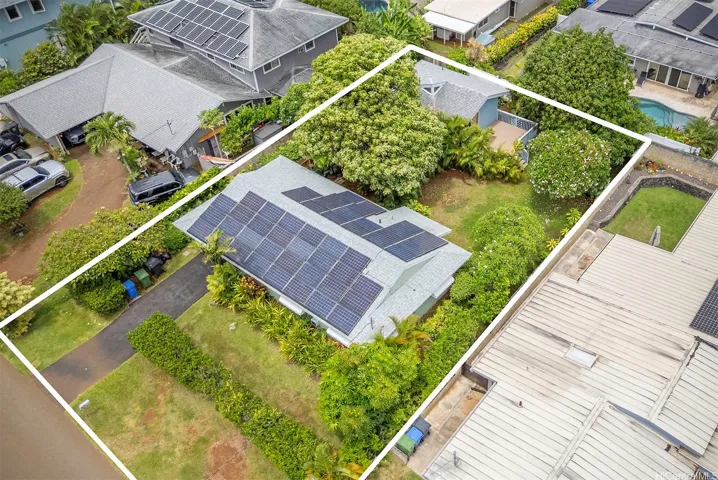 View showing house & cottage (lots of PV panels)
