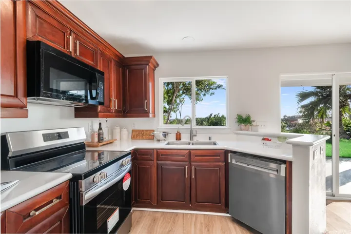 A kitchen built for West Side days — central AC keeps it easy year-round.
