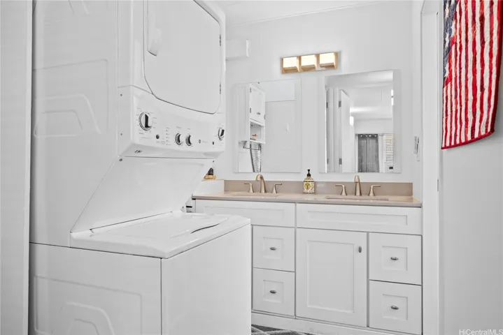 Washer/Dryer and duo vanity sinks.