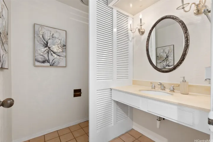 Powder room off the main living area for guests.