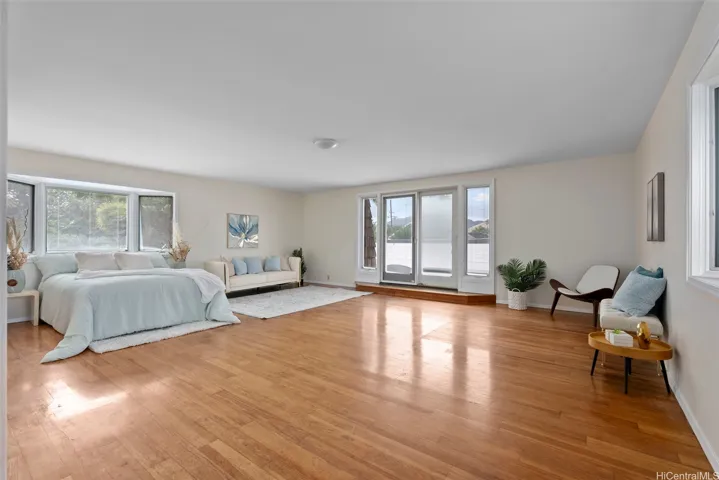 Upstairs the full 2nd floor w/approx. 972 sq ft of primary ensuite privacy and doors lead outside to the roof top and 32-panel Photovoltaic system.