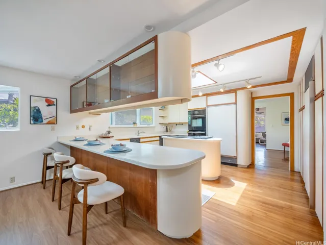 Open living and kitchen areas create a natural flow for everyday island living and hosting family and friends.