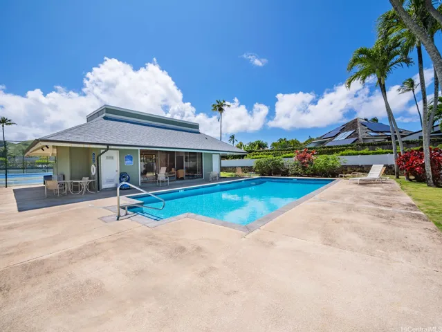 Hale Kai's refreshing community pool and spacious deck provide an ideal place to unwind after a day at the beach.