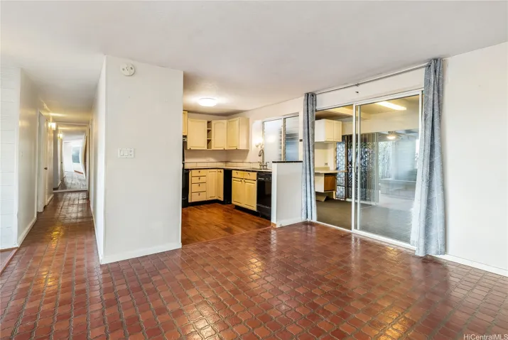 Dining area with covered lanai behind.