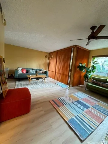 Enhanced.  Second bedroom used as family room open to living room