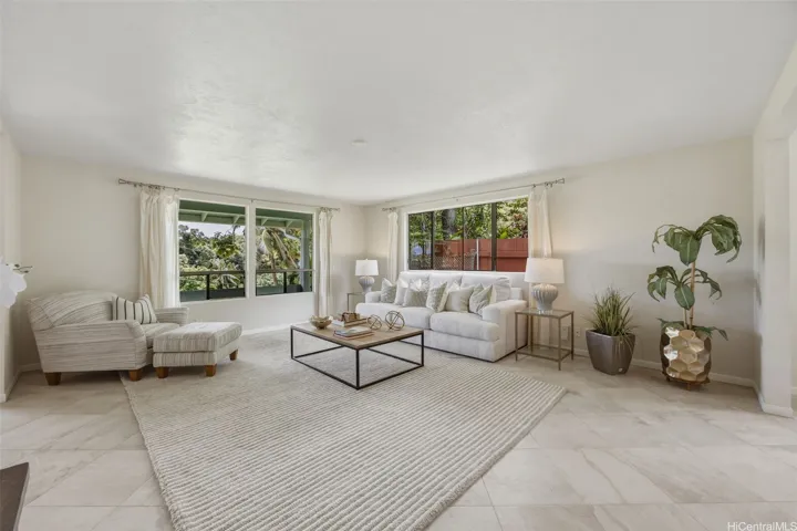 Formal living room can accommodate all of your furniture needs.